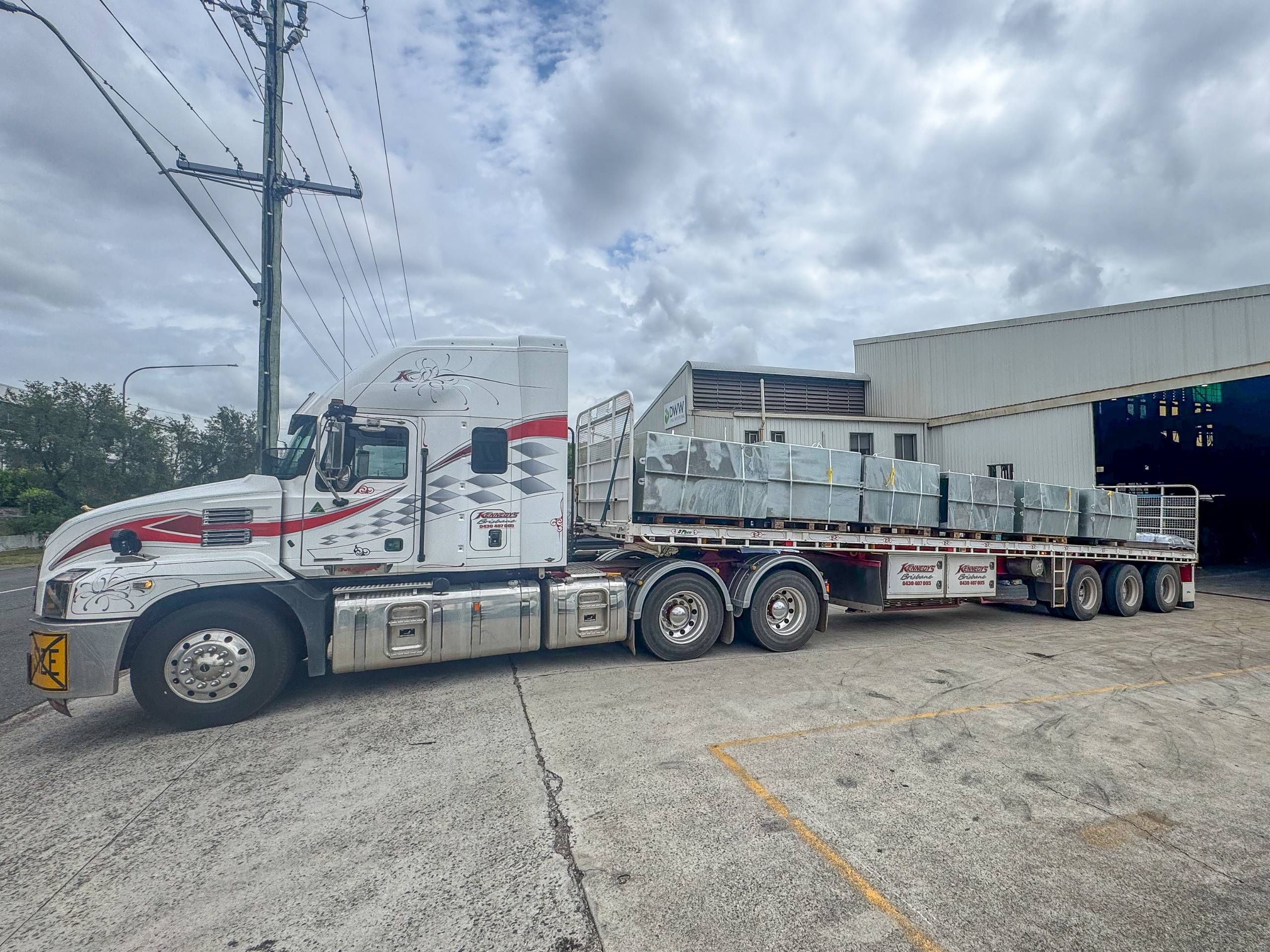 steel blast shields loaded onto a large truck ready for dispatch