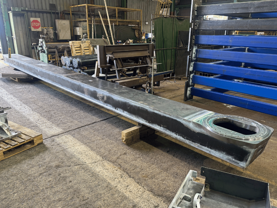 Mining liner handler fabrication showing a fabricated structural steel beam assembly in DWW Engineering’s workshop.