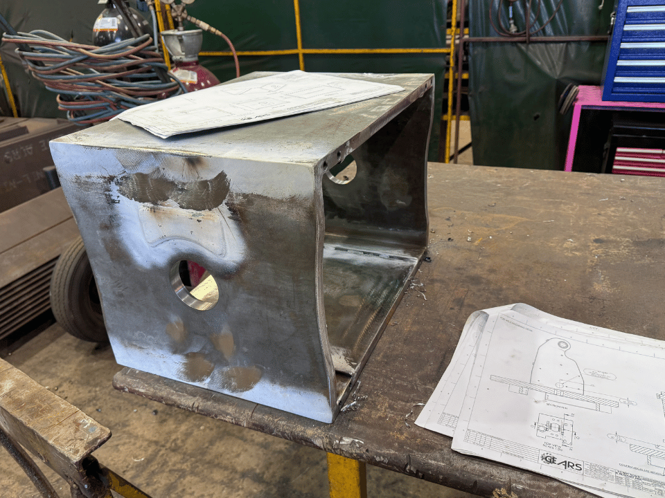 Mining liner handler fabrication showing a fabricated structural steel rocker box at DWW Engineering’s workshop.