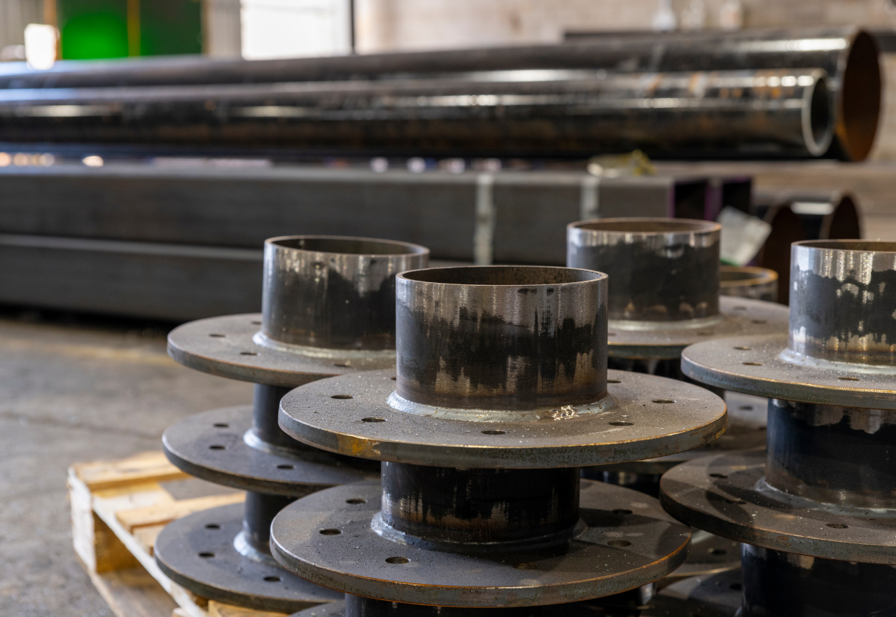 Structural steelwork flange and pipe assemblies fabricated for industrial plant applications.