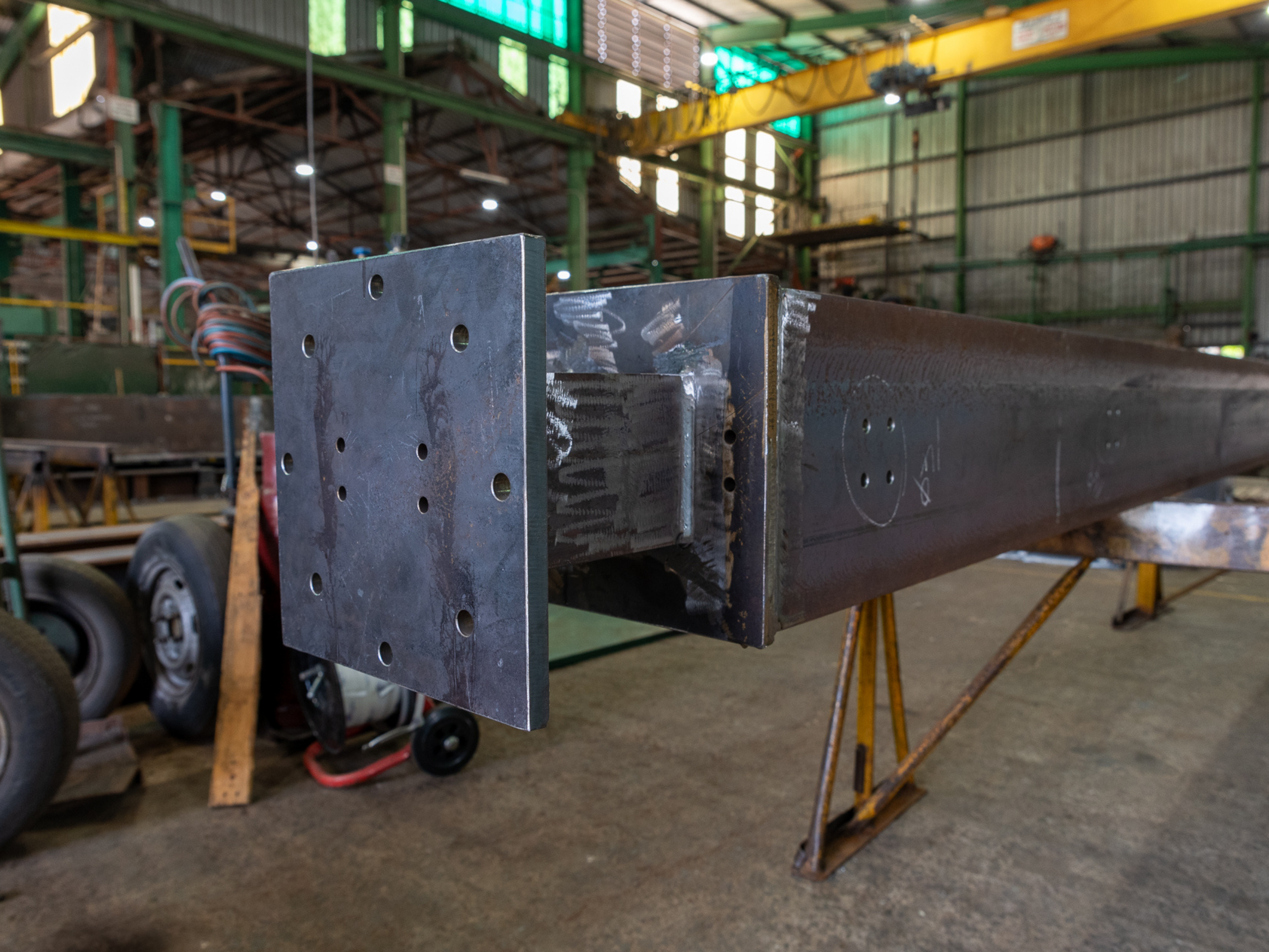 Structural steelwork beam section with end plate fabricated in DWW Engineering’s workshop.